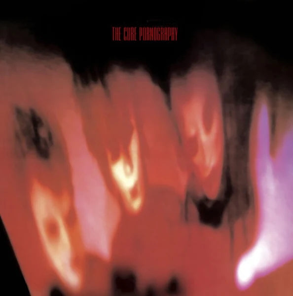 Album cover with abstract design and text 'The Cure Pornography' at the top.
