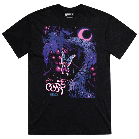 Black shirt featuring artwork of a pink and purple butterfly landing on a branch of berries under a pink and purple crescent moon, with "The Cure" logo and Nickelsdorf event details on the bottom right. 