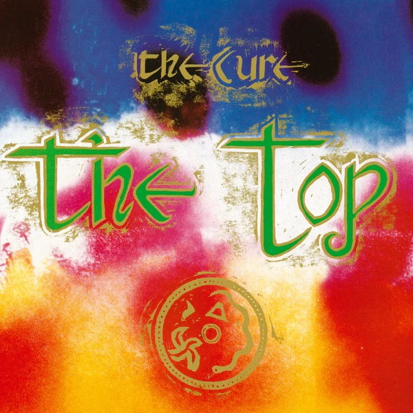 Album cover for 'The Top' by The Cure with colorful abstract design and text.